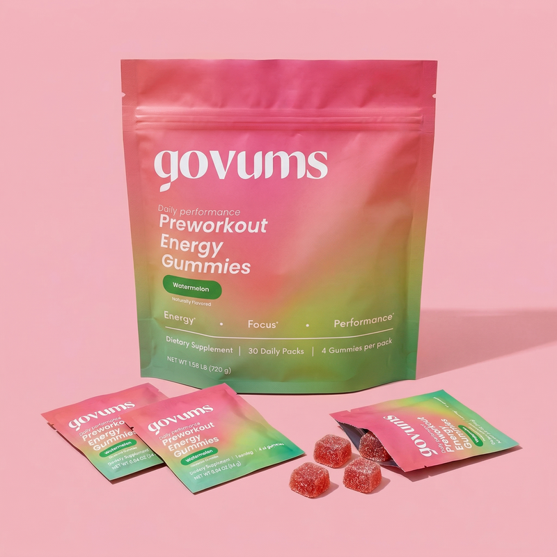 govums preworkout energy gummies packaging and gummies on a pink background